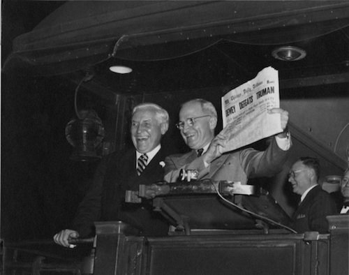 President Harry Truman holds up a famous paper famously proclaimed the wrong president (Wikimedia Commons) 