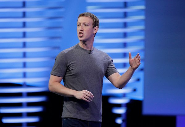 Facebook CEO Mark Zuckerberg delivers the keynote address at the F8 Facebook Developer Conference Tuesday, April 12, 2016, in San Francisco. Zuckerberg said Facebook is releasing new tools that businesses can use to build "chatbots," or programs that can talk to customers in conversational language. (AP Photo/Eric Risberg)